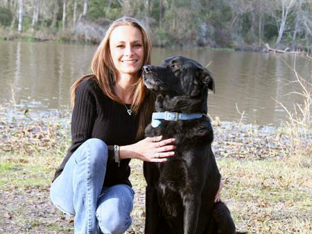 Haus (7yrs old from Houston, TX) strikes a statuesque pose with his owner Natasha. Haus was adopted from the Houston SPCA in May 2008.